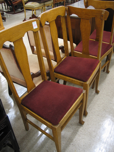 Appraisal: SET OF FOUR OAK DINING CHAIRS American c having T-shaped