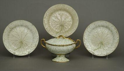 Appraisal: Wedgwood Creamware Cabbage-Leaf Sauce Tureen Together with four Wedgwood creamware