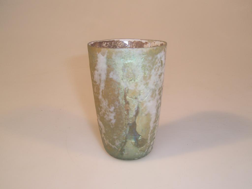 Appraisal: A Roman slightly flaring greenish glass beaker with a cut-off