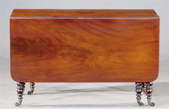 Appraisal: American Classical carved mahogany drop-leaf table circa rectangular top with