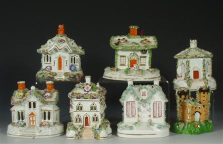 Appraisal: A group of seven mid th century Staffordshire pastille burners