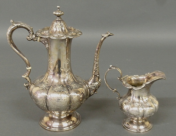 Appraisal: - Sterling silver coffeepot h and a matching creamer by