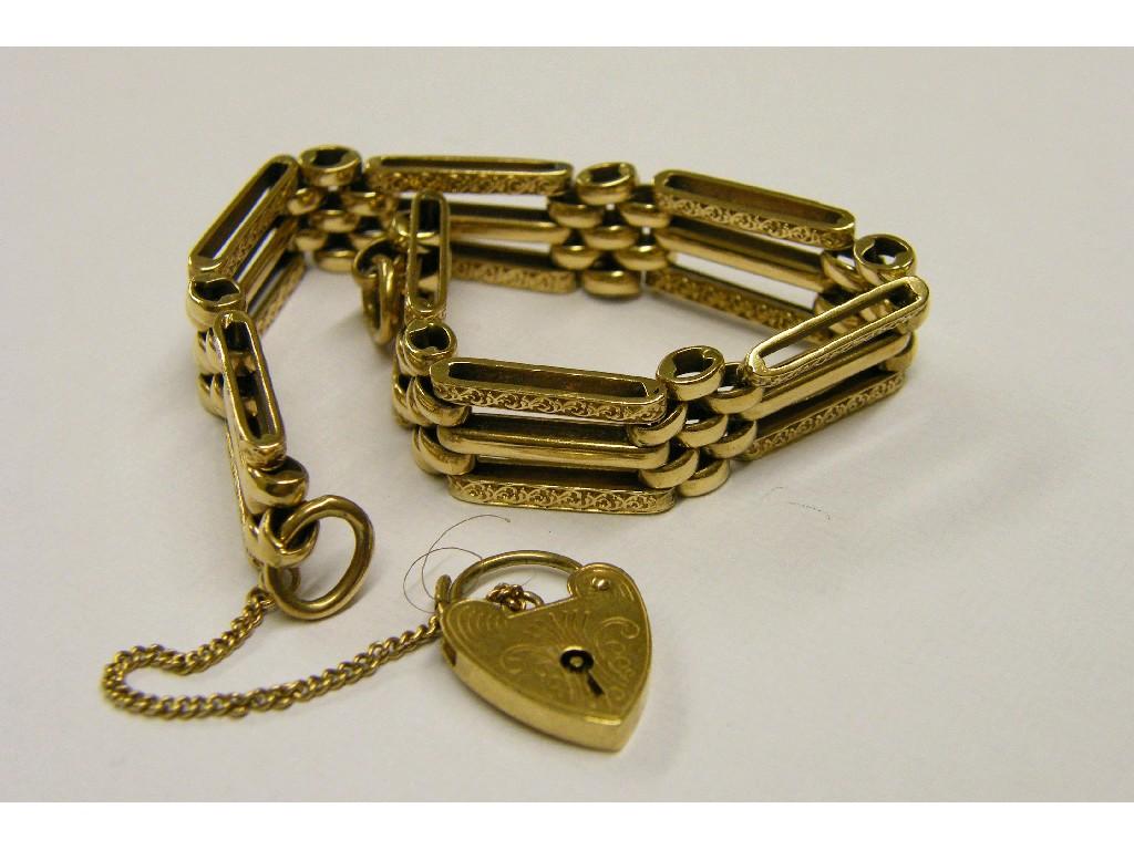 Appraisal: ct engraved three row gate bracelet with safety chain and