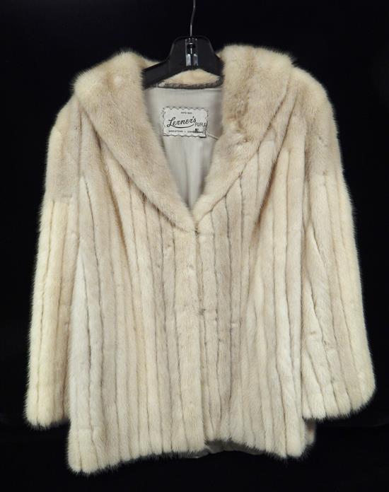 Appraisal: Short fur coat white with vertical strips fold over lapel