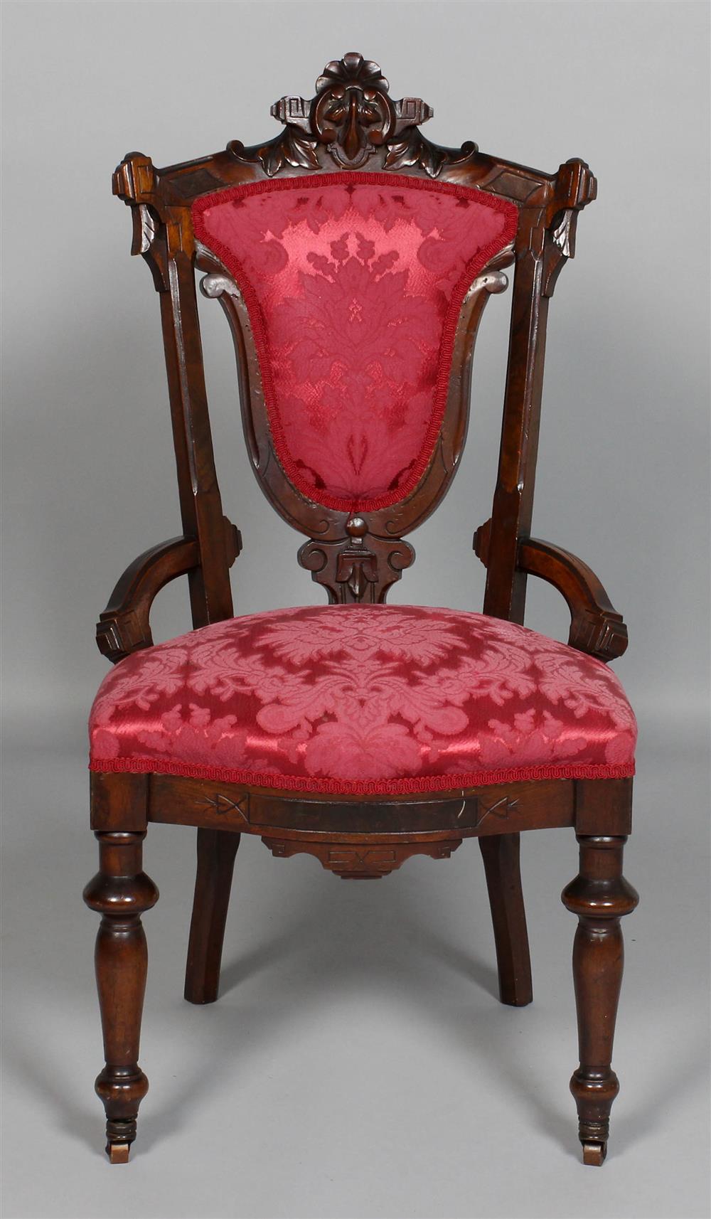 Appraisal: LADY'S VICTORIAN EASTLAKE STYLE CARVED WALNUT SIDE CHAIR the arching