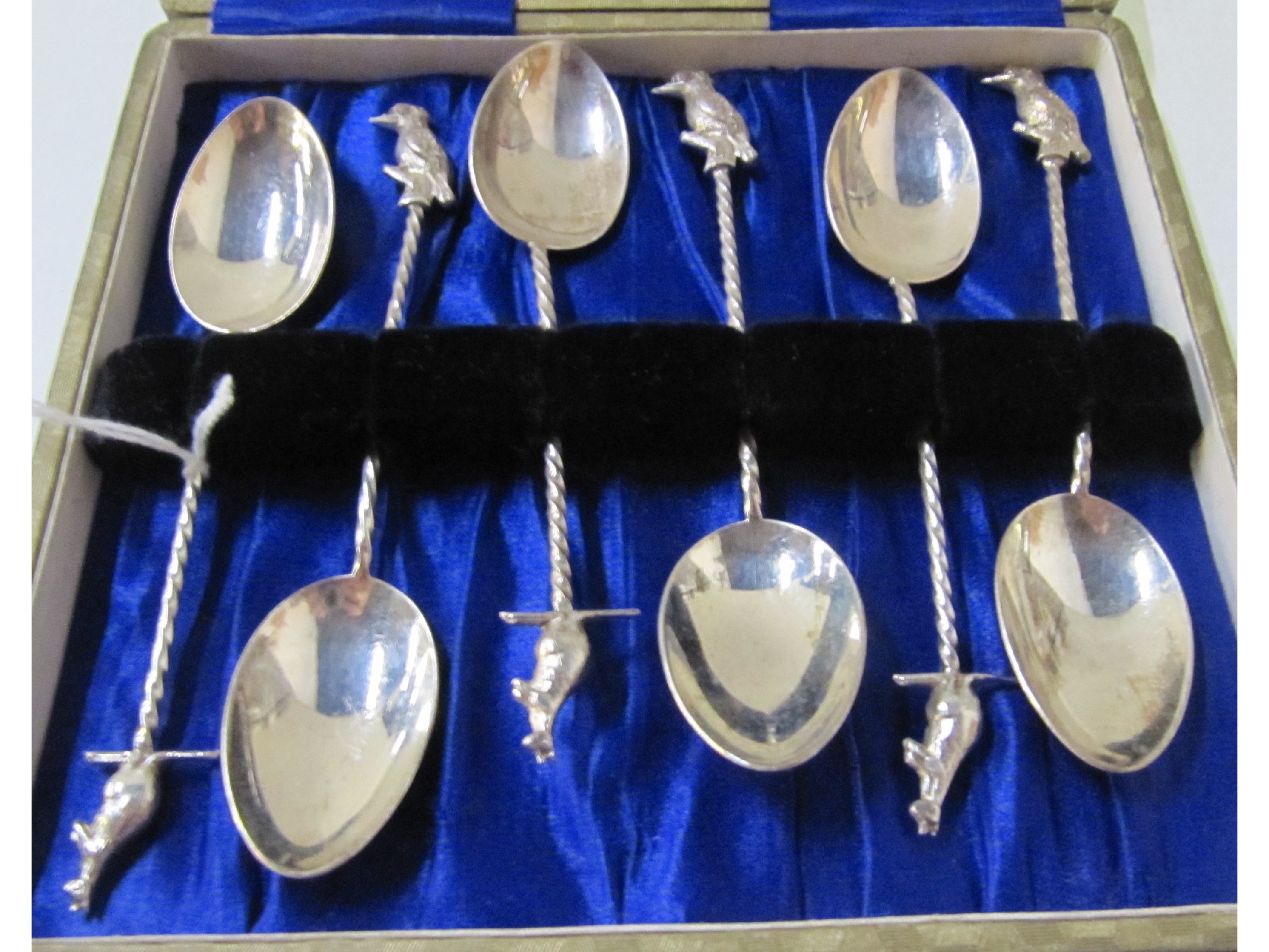 Appraisal: A set of six sterling silver teaspoons with finials modelled