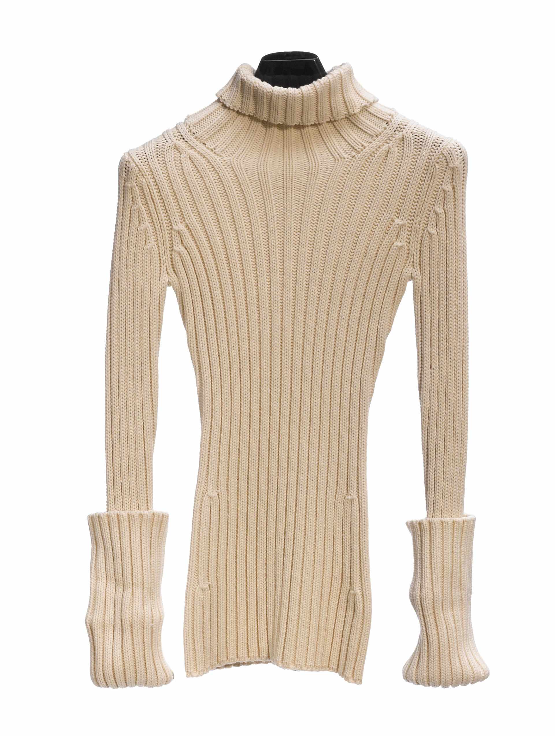 Appraisal: A Yohji Yamamoto long beige cable knit turtle neck sweater