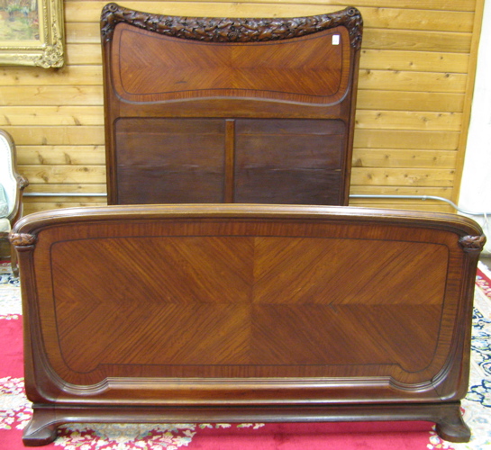 Appraisal: ART NOUVEAU MAHOGANY AND CARVED OAK BED WITH RAILS French