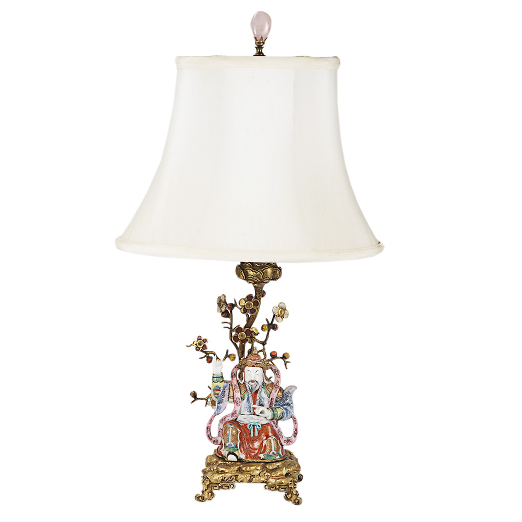 Appraisal: Louis XV Style Gilt-Bronze Mounted Chinese Porcelain Figural Lamp The