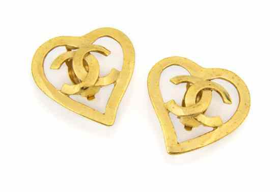 Appraisal: A Pair of Chanel Goldtone Logo Heart Earclips Spring openwork