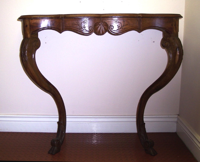 Appraisal: French Provincial Walnut Console Table early th century the shaped