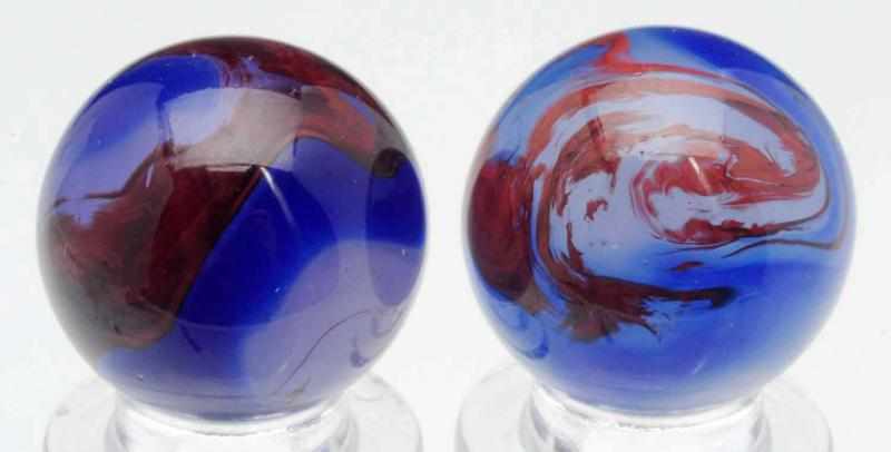 Appraisal: Lot of Akro Agate Blue Onyx Oxblood Marbles Both with