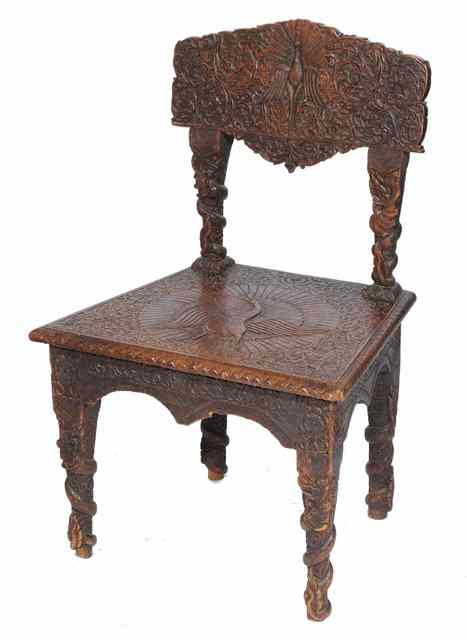 Appraisal: AN ANGLO INDIAN CARVED HARDWOOD CHAIR the back and seat