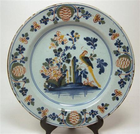 Appraisal: An th century Delft polychrome plate decorated to the border