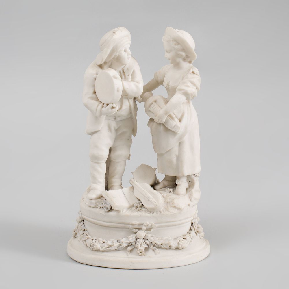 Appraisal: French Biscuit Porcelain Figure Group of Youth with Tambourine and