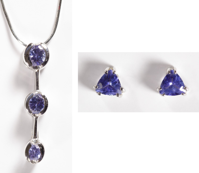 Appraisal: THREE ARTICLES OF TANZANITE JEWELRY including a pair of k