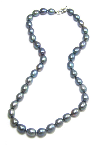 Appraisal: PRINCESS LENGTH BLACK PEARL NECKLACE measuring inches in length and