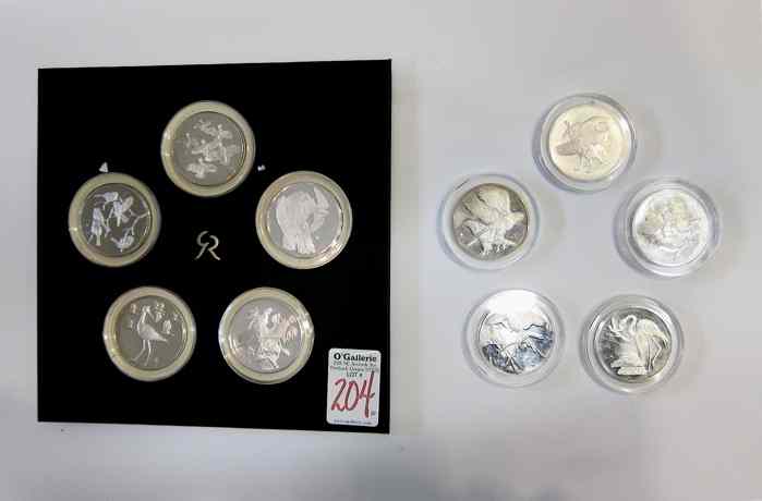 Appraisal: COLLECTION OF FRANKLIN MINT STERLING MEDALS Roberts Birds '' series