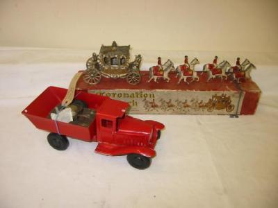 Appraisal: A Triang tipper lorry a small clockwork British tank and