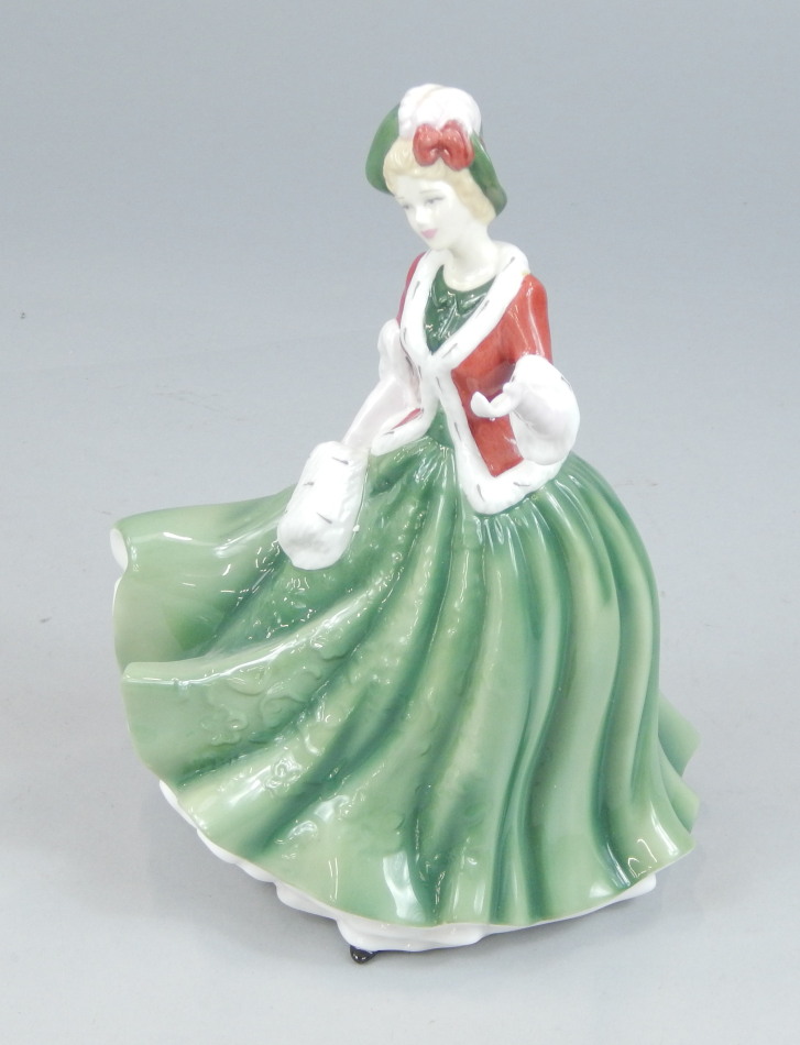 Appraisal: A Royal Doulton porcelain lady Christmas Day from The Pretty