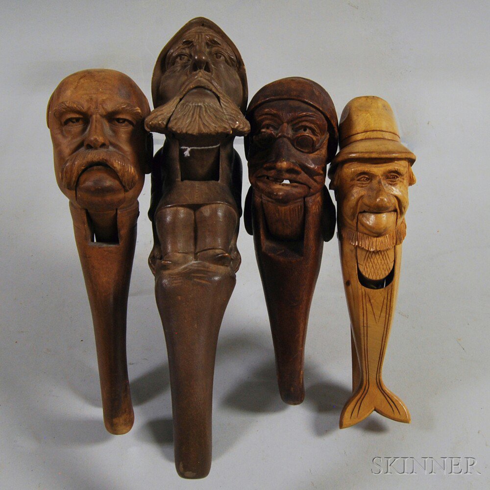 Appraisal: Four Figural Folk Art Carved Nutcrackers all carved with a