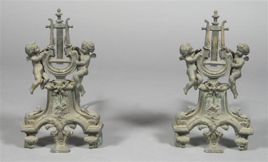 Appraisal: A Pair of Continental Cast Metal Figural Chenets Height inches