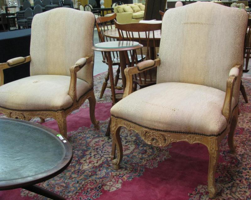 Appraisal: Pair of French Style Carved Arm Chairs with nail head