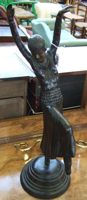 Appraisal: A modern bronze after Chiparus an Art Deco dancer on