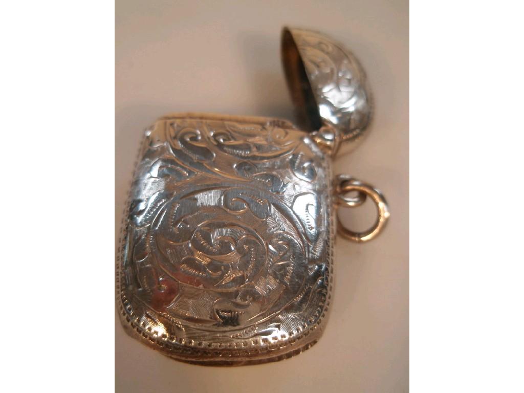 Appraisal: An Edward VII silver vesta case engraved with foliate scrolls