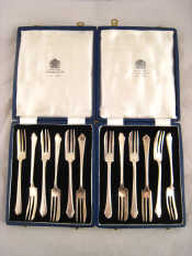 Appraisal: Two boxed sets of six silver cake forks by Mappin