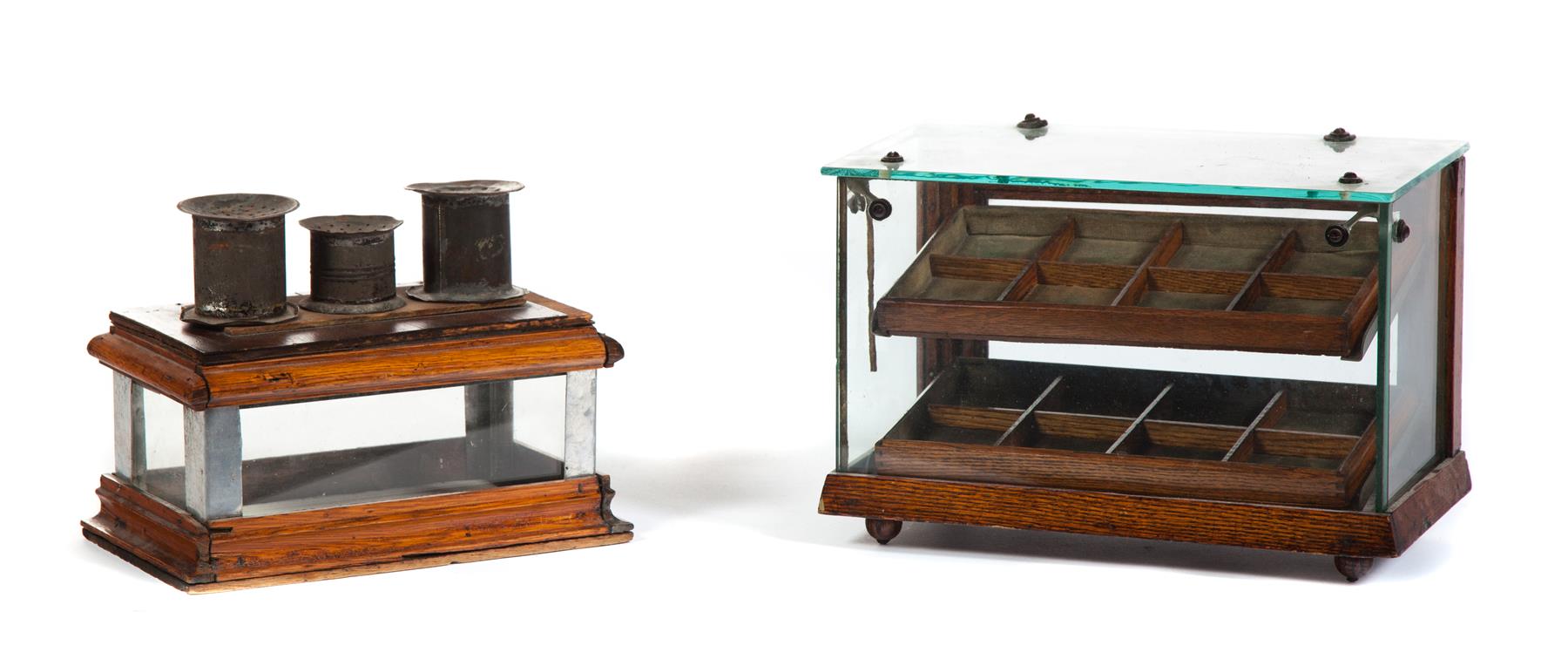 Appraisal: TWO SMALL DISPLAY CASES American ca oak Casket-shape with hinged