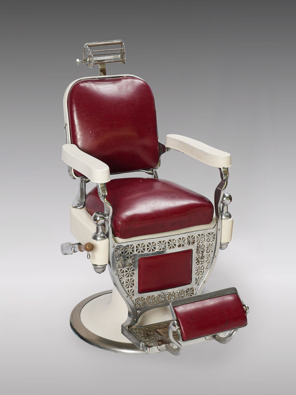 Appraisal: THEO-A-KOCH'S BARBER CHAIR Barber chair made by the Theo-A-Koch's of