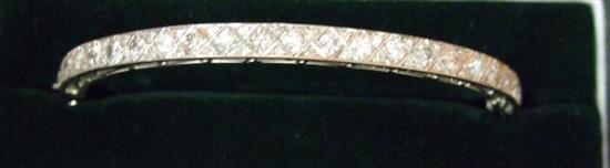 Appraisal: Diamond set hinged white gold bangle hallmarked ct