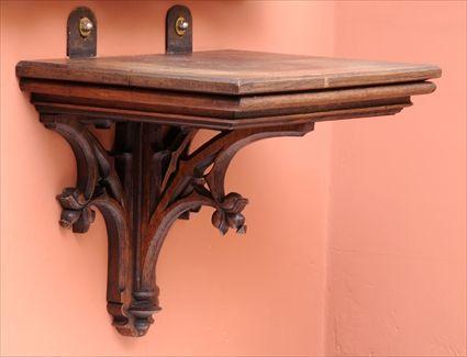 Appraisal: GOTHIC REVIVAL CARVED OAK WALL BRACKET The rectangular top on