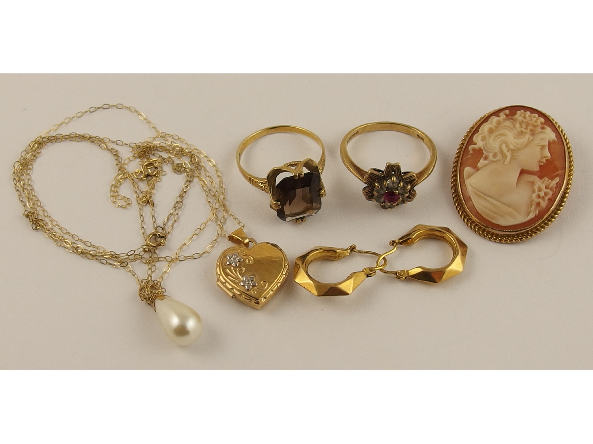 Appraisal: A ct smoky quartz ring ct cameo brooch and other