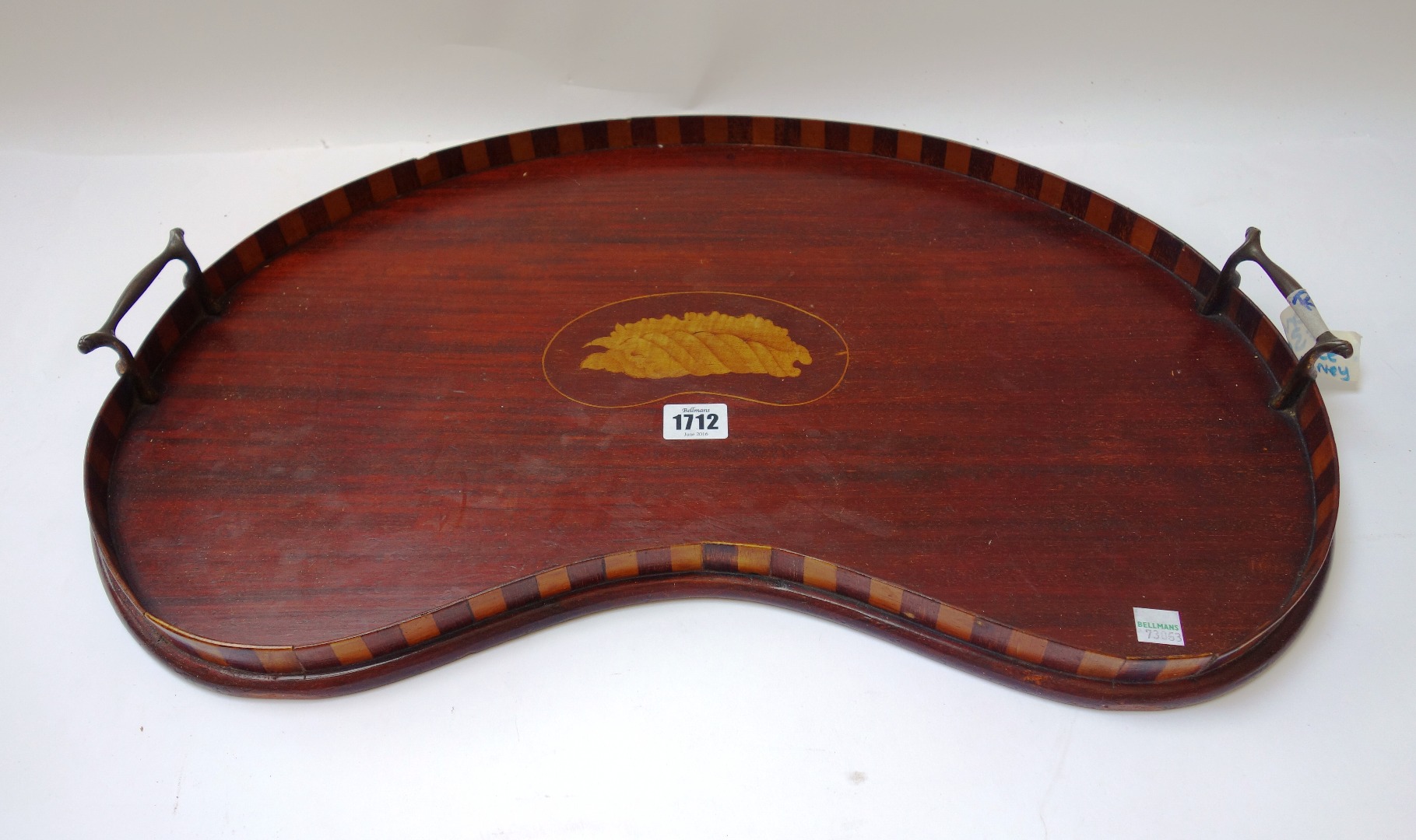 Appraisal: A th century mahogany marquetry inlaid kidney shaped tray cm