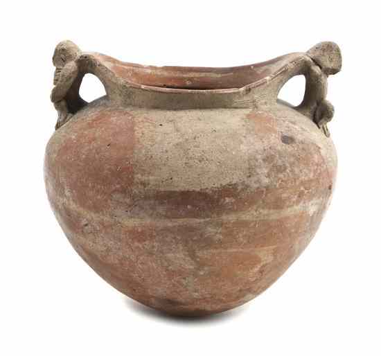 Appraisal: A Pre-Columbian Vessel with animal form handles Width inches