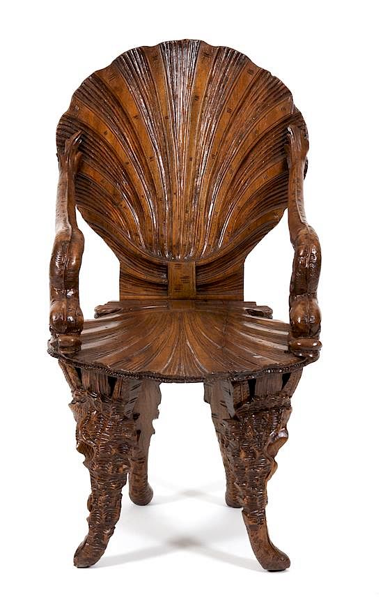 Appraisal: A Venetian Carved Walnut Grotto Armchair Height inches A Venetian