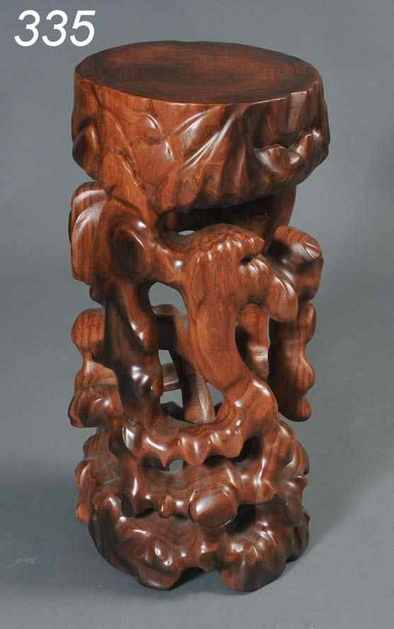 Appraisal: Chinese Tree Trunk Stand carved from a single piece ''