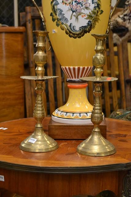 Appraisal: A PAIR OF TH CENTURY STYLE BRASS CANDLESTICKS A PAIR