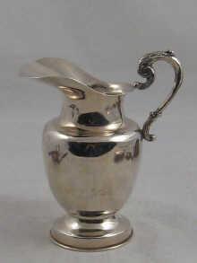 Appraisal: A Mexican silver milk jug circa cm high weight approx