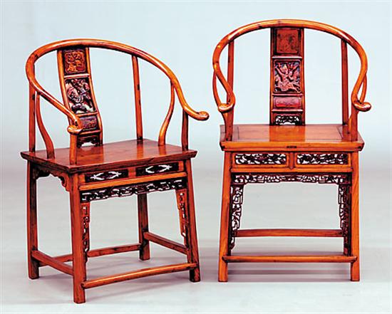 Appraisal: Two Chinese carved elm armchairs th century horseshoe back with