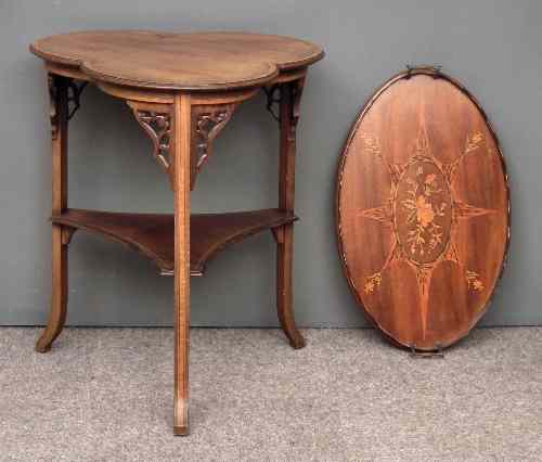 Appraisal: An Edwardian mahogany trefoil topped occasional table crossbanded in satinwood