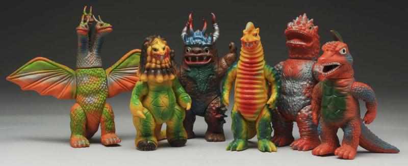 Appraisal: Lot of Vinyl Japanese Superhero Figures Includes scarcer three-headed dragon