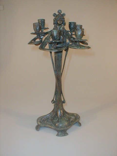 Appraisal: An Art Nouveau style green patinated bronze candelabrum