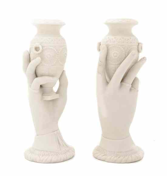 Appraisal: A Pair of English Ceramic Decorative Sculptures each registered as