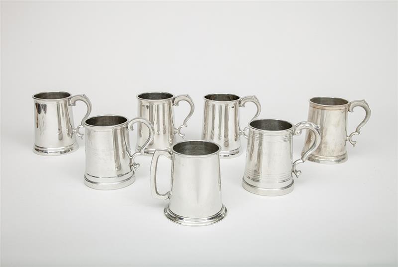 Appraisal: Assembled Group of Seven English Pewter Glass-Bottom Mugs Two bearing