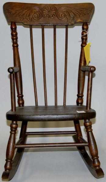 Appraisal: Child's Wooden Rocker Embossed Condition Excellent Size x