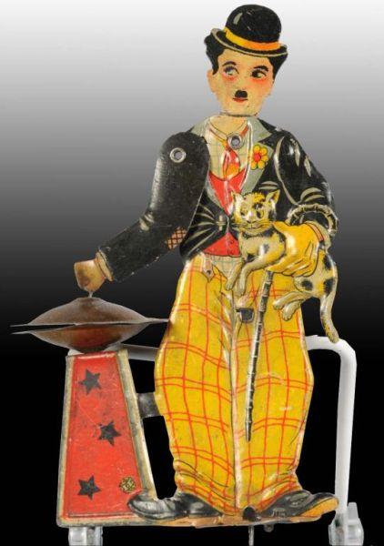 Appraisal: Tin Distler Charlie Chaplin Cymbal Toy Description German Marked Made