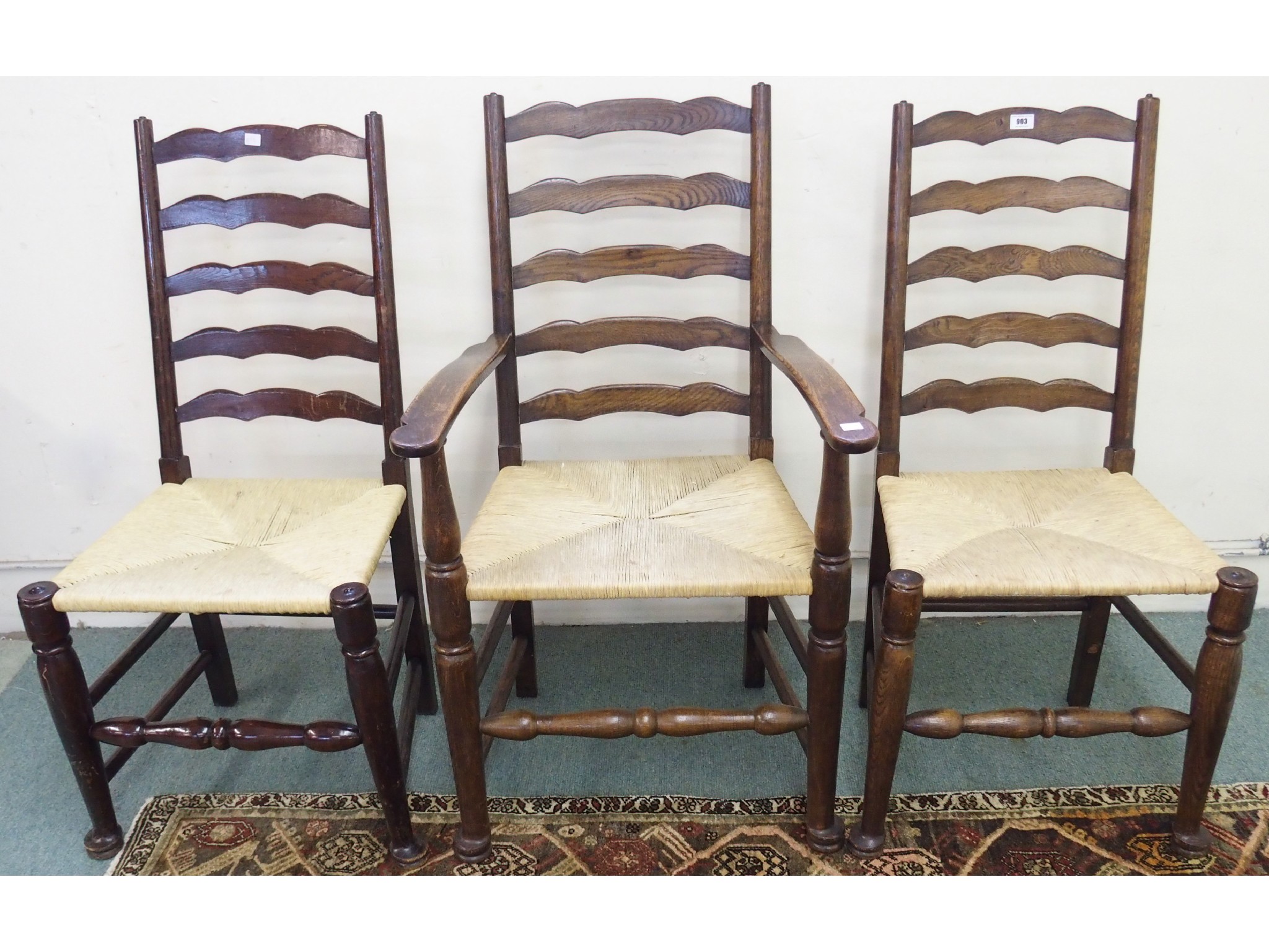 Appraisal: A set of ten ash ladderback chairsincluding two armchairs with